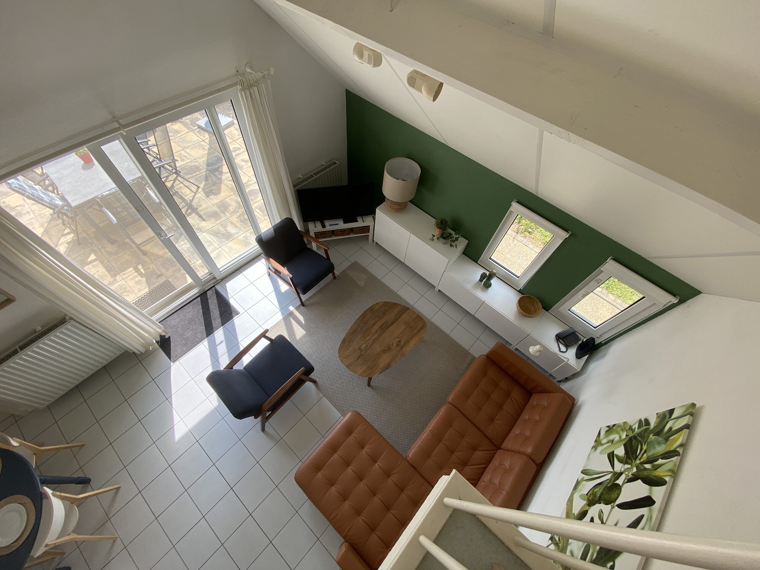 Woonkamer vanaf trap 627b6b8f61b66
